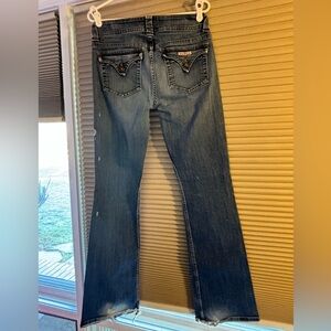 Hudson Woman’s Jeans size 29 mid rise distressed.